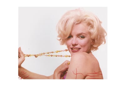 Marilyn stretching the jewelry